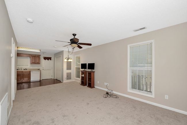 Living Room- carpet, ceiling fan | Image 8