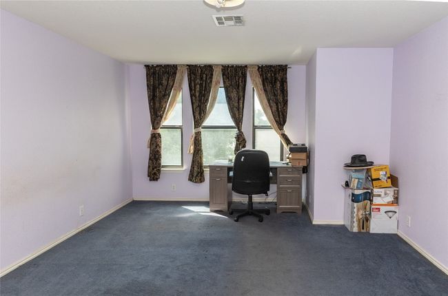 Office area featuring dark carpet | Image 8