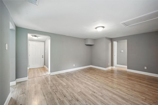 Unfurnished room with light wood finished floors | Image 6