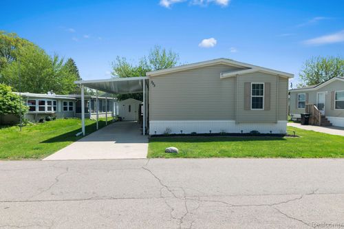 303 Toucan St, Rochester Hills, MI, 48309-4613 | Card Image