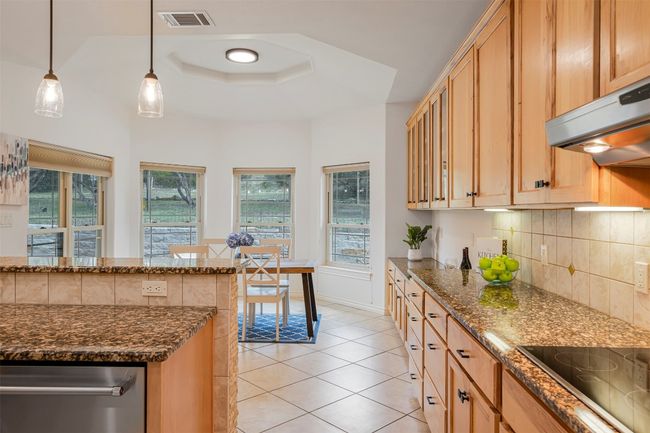 Custom cabinets throughout. | Image 7