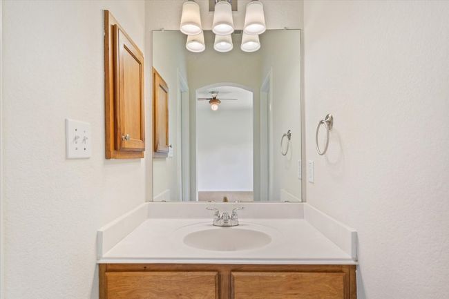 Bathroom with vanity and a ceiling fan | Image 24