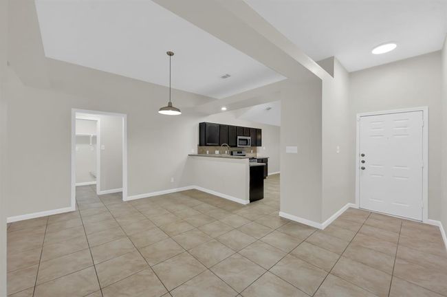 Dining area, by the breakfast bar. | Image 12
