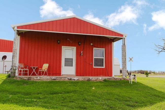 View of front of tiny home on 80 acres | Image 5