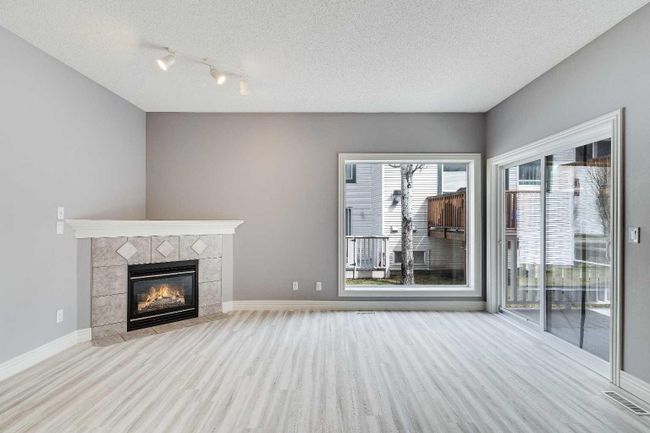 135 Bridlewood View Sw, Home with 4 bedrooms, 2 bathrooms and 3 parking in Calgary AB | Image 8