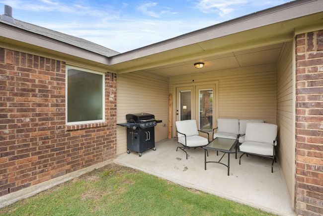 View of patio featuring a grill | Image 26