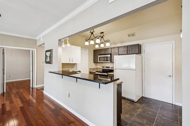 Open concept kitchen with newer appliances | Image 15