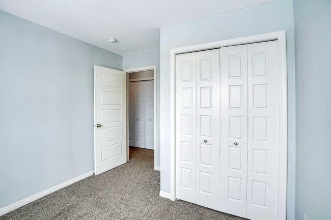 201 - 70 Saddlestone Dr Ne, Townhouse with 2 bedrooms, 3 bathrooms and 1 parking in Calgary AB | Image 22