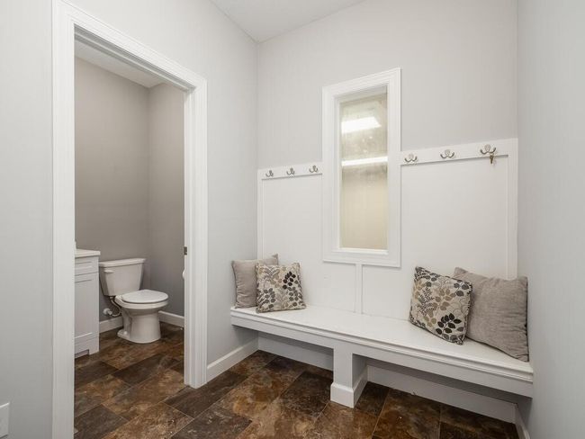 The kitchen pantry, master bedroom closet and mudroom storage closet's were customized by Closets by Design. | Image 12