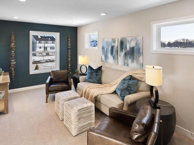 At the top of the stairs, you'll find a versatile loft space, perfect for a cozy reading nook, home office, or play area – offering endless possibilities to suit your lifestyle. | Image 20