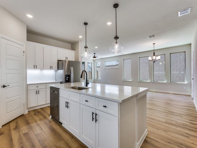 This spacious kitchen offers outstanding storage and prep space! | Image 7