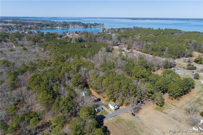 Bird's eye view with a view of trees and a water | Image 35