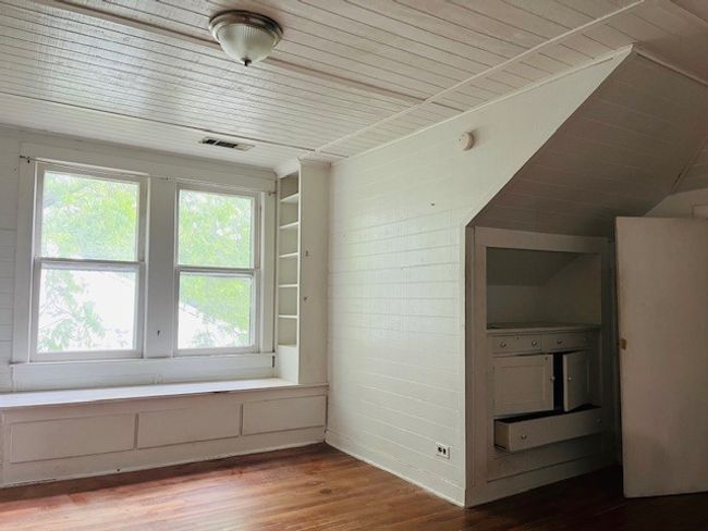 Bonus room with healthy amount of natural light, wood finished floors, and wooden ceiling | Image 27