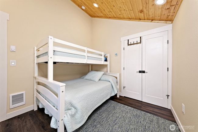 Main level bedroom and closet. | Image 17