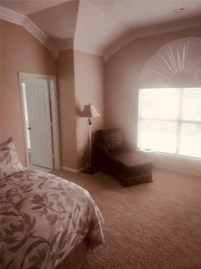 Owner's Ensuite features a huge bedroom with plenty of natural light. | Image 24