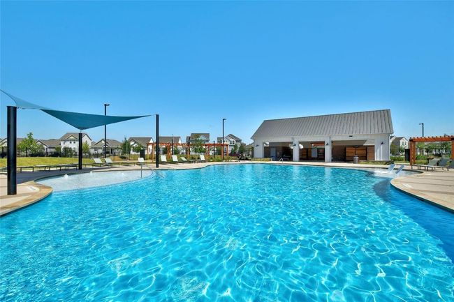 Community pool featuring a patio area | Image 17