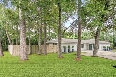 1902-1904 America Street, Home with 4 bedrooms, 2 bathrooms and null parking in Mandeville LA | Image 1