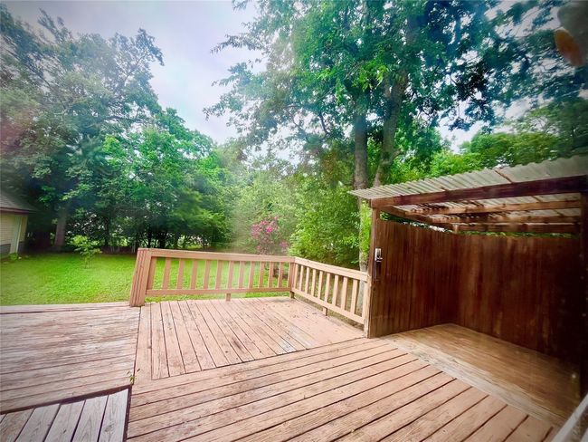 Deck featuring a yard | Image 21