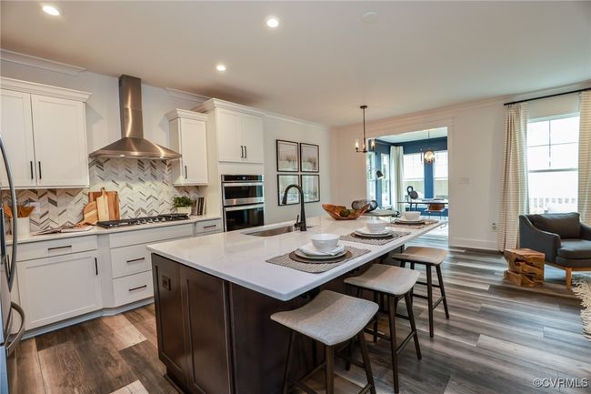VIRTUAL STAGING. Photo represents the plan with virtual staging. Kitchen with island and pantry. | Image 6