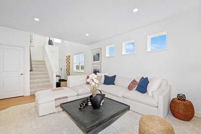 (Photo of decorated model, actual home's finishes will vary) Stay cozy in this contemporary great room! | Image 10