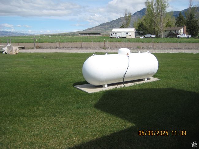View of yard with a rural view and a mountain view | Image 9