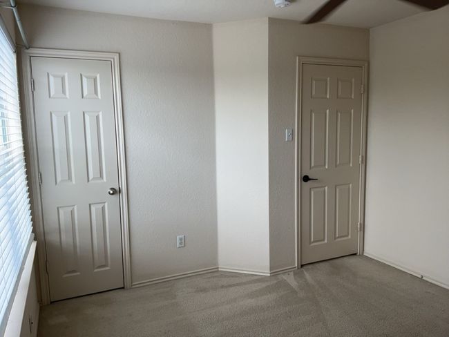 Bedroom featuring carpet and closet | Image 13