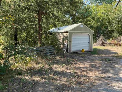 View of outdoor structure featuring a garage | Image 3