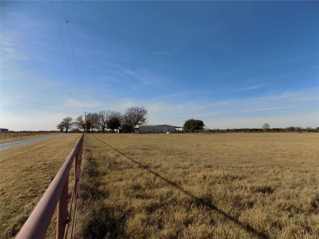 Driveway and Fenced Area Leading to Property | Image 38