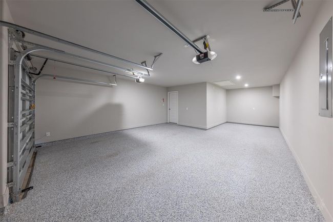 3 car garage with epoxy coated floors. | Image 33