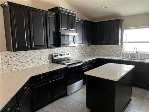 424 Buchannan Dr, DAVENPORT, FL, 33837-3672 | Card Image
