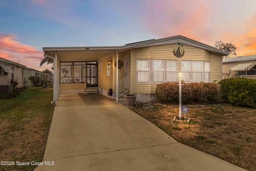 703 Amaryllis Dr, Barefoot Bay, FL, 32976-7181 | Card Image