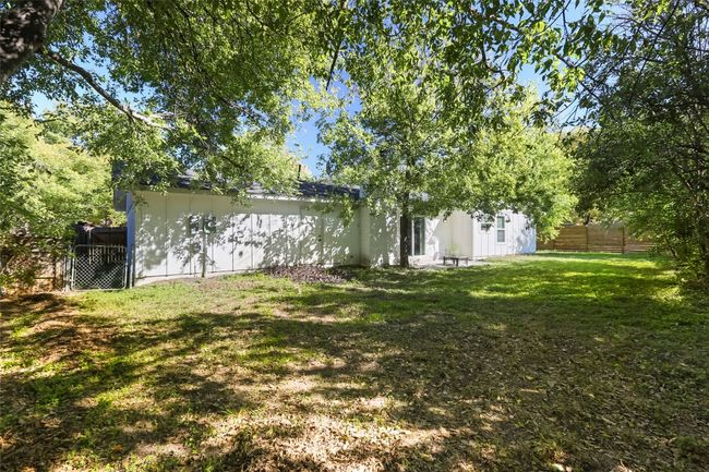 Large Shaded back yard with room to roam | Image 19