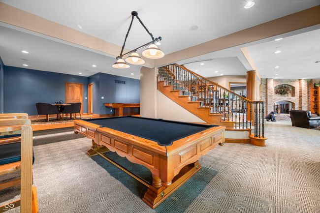 playroom featuring visible vents, recessed lighting, a brick fireplace, carpet, and billiards | Image 75