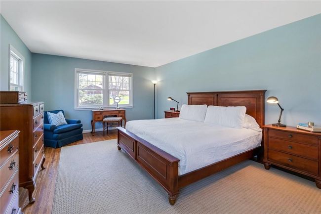 Primary bedroom with private bath and walk in closet. | Image 20
