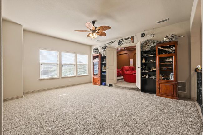 Upstairs family room with grand entrance to media room | Image 21