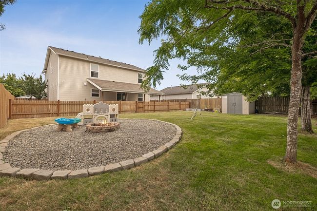 Play area in fully fenced yard. | Image 25