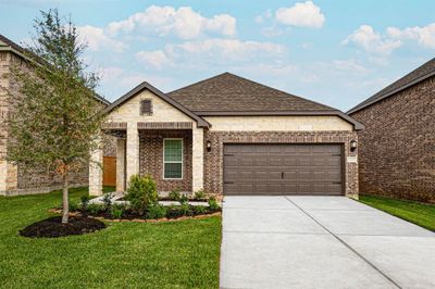 This home has a beautiful floorplan with great curb appeal and front yard landscaping. It comes with a two-car garage which has upgraded carriage lights for safety and security at night. | Image 1