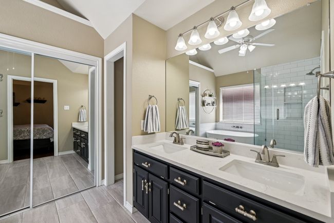 Recently updated Primary bath with dual sinks. | Image 21