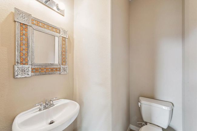 Half Bath is located by the family room | Image 15