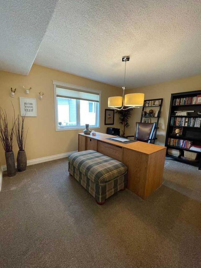 24 Evergreen Park Close W, Home with 4 bedrooms, 3 bathrooms and 5 parking in Brooks AB | Image 24
