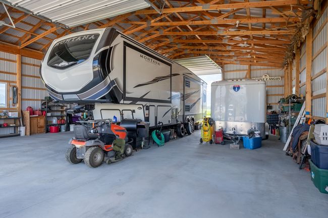 This RV building is actually larger than the house! | Image 36