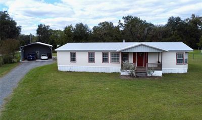 19414 Nw 135 Th Lane, House other with 3 bedrooms, 2 bathrooms and null parking in Lake Butler FL | Image 2