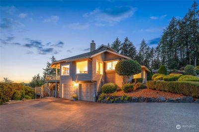 Breathtaking bird’s eye panoramic view of Henderson Bay and Mt. Rainier from multiple viewpoints in and around the home. | Image 2