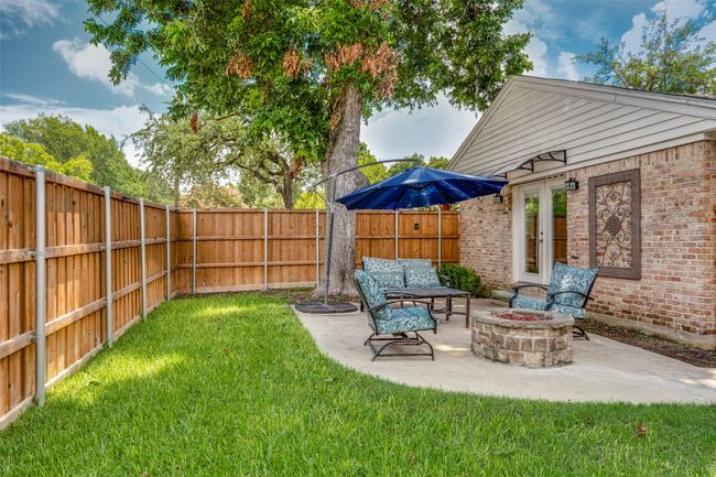 Another view of the side patio and firepit. Nice olace to gather. | Image 21