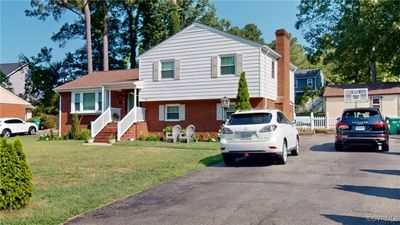 Split level home with a front lawn | Image 2