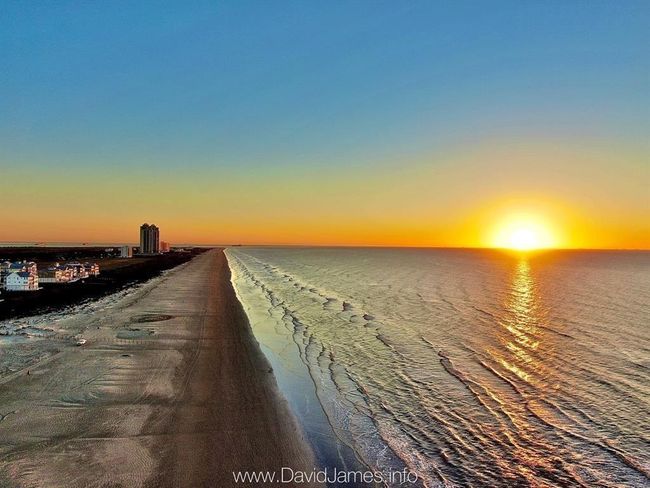 Experience breathtaking sunrises over the island's serene east end. | Image 19
