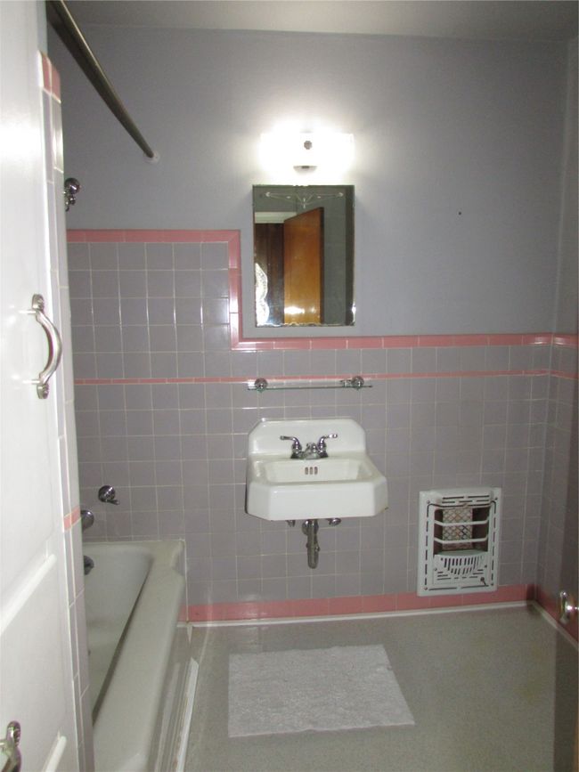 Hall bathroom with tub and shower | Image 14