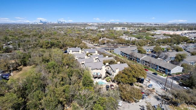 The community provides added security with a gated entrance, a reserved parking spot, and ample guest parking. | Image 7