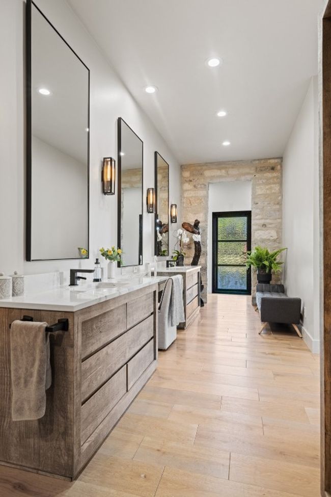 Full bathroom with double vanity, wood finished floors, and recessed lighting | Image 27