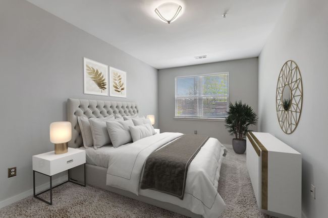 Spacious primary bedroom with plush carpet, large window for natural light and fresh neutral paint. This room is virtually staged. | Image 6